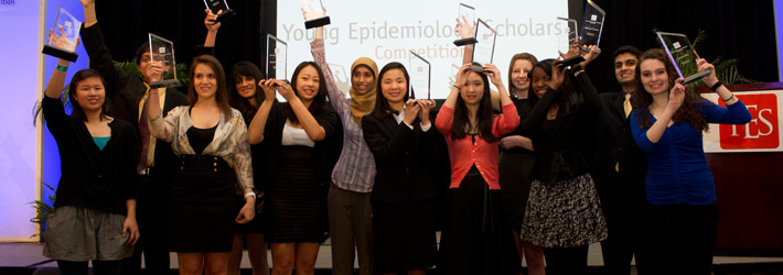 An image of the 12 National Finalists holding their awards.